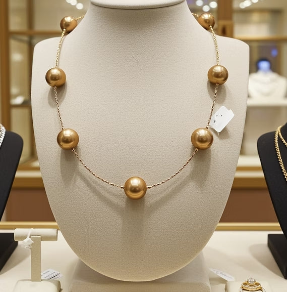 Collana in oro gialla18k e perle naturale australiana 12mm