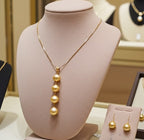 set Collana e Orecchi con perla naturale in Oro Giallo 18k