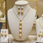 set Collana e Orecchi con perla naturale in Oro Giallo 18k