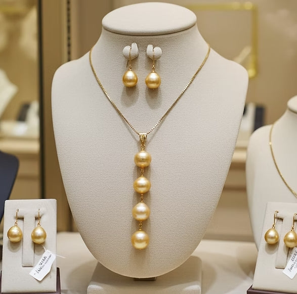 set Collana e Orecchi con perla naturale in Oro Giallo 18k