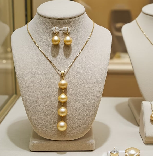 set Collana e Orecchi con perla naturale in Oro Giallo 18k