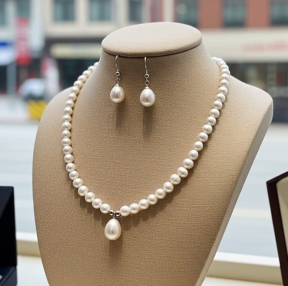 Set Collana e Orecchi con perla naturale in Oro Bianco 18k