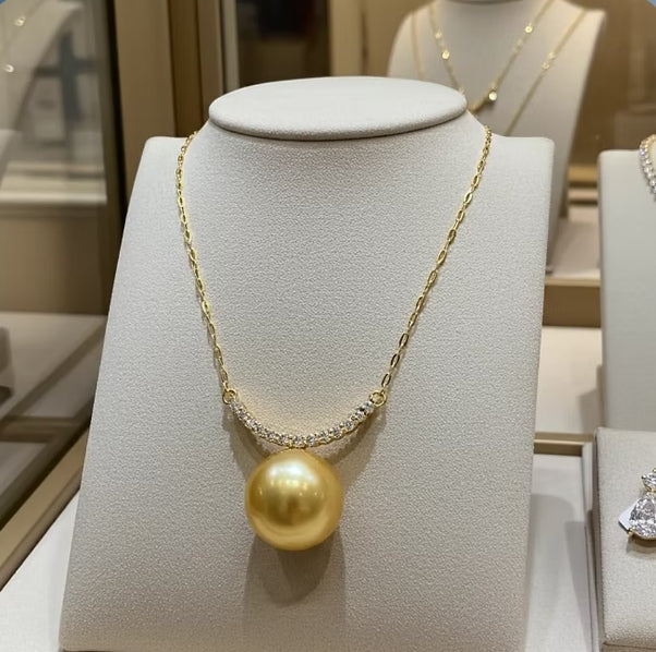 Collana in oro 18k e diamanti naturali 0.30ct e perle australiana 10mm