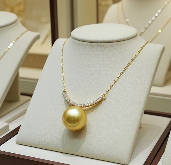 Collana in oro 18k e diamanti naturali 0.30ct e perle australiana 10mm