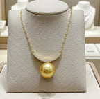 Collana in oro 18k e diamanti naturali 0.30ct e perle australiana 10mm