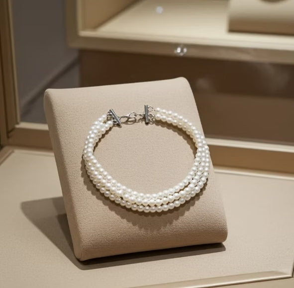 bracciale in oro bianco 18k e perla naturale in varie modello