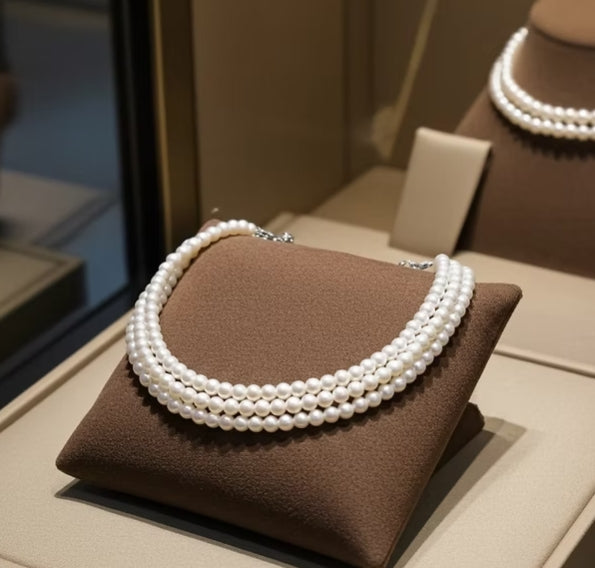 bracciale in oro bianco 18k e perla naturale in varie modello