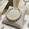 bracciale in oro Giallo 18k con perla naturale australiane 8mm