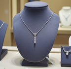 Collana trilogy in oro bianco 18k con diamanti naturali 0.60ct