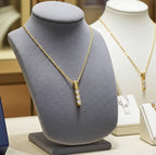 Collana trilogy in oro Giallo 18k con diamanti naturali 0.60ct