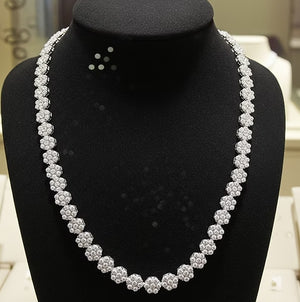 Collana tennis Fiorellino in oro 18k e diamanti naturali 7,70ct
