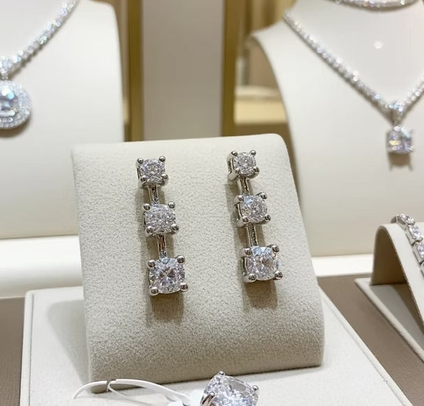 Orecchini punto luce trilogy in oro bianco e diamanti naturali 0.72ct