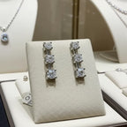 Orecchini punto luce trilogy in oro bianco e diamanti naturali 0.60ct