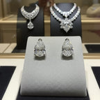 Orecchini punto luce in Oro Bianco 18k -  taglio Pera 0,26ct Diamante Naturale