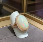 Anello in oro giallo e diamanti naturali 0.81ct e opale 16.30ct